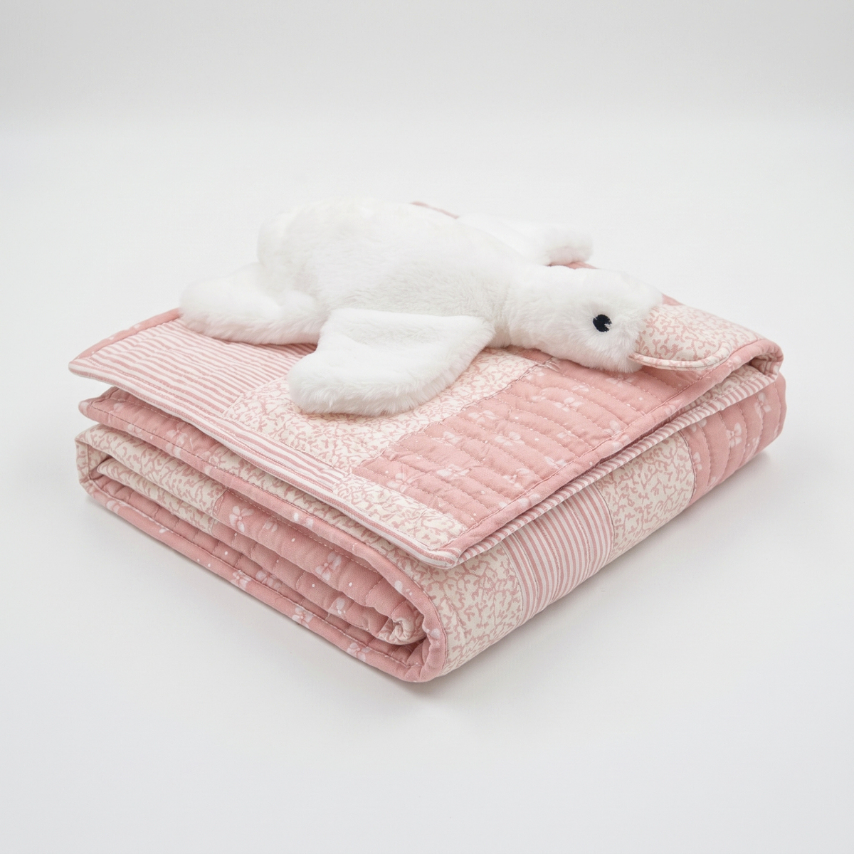 Handmade Quilt Set for babies, featuring a soft pink design and a plush toy, perfect for gifting.