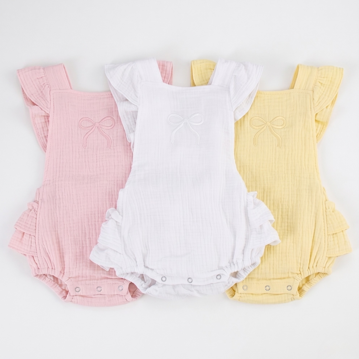 Ruffled muslin bow romper in pink – 100% cotton baby romper – Lullave Boutique