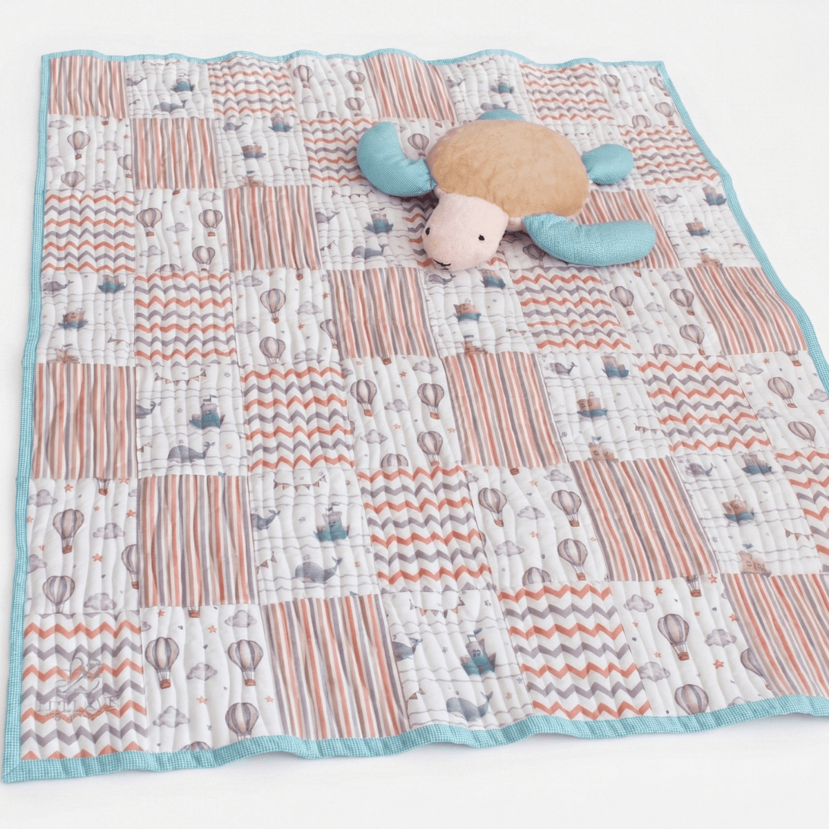 Personalised Baby-Toddler Quilt Gift Set with Pillow & Toy featuring a colorful handmade quilt and plush toy.