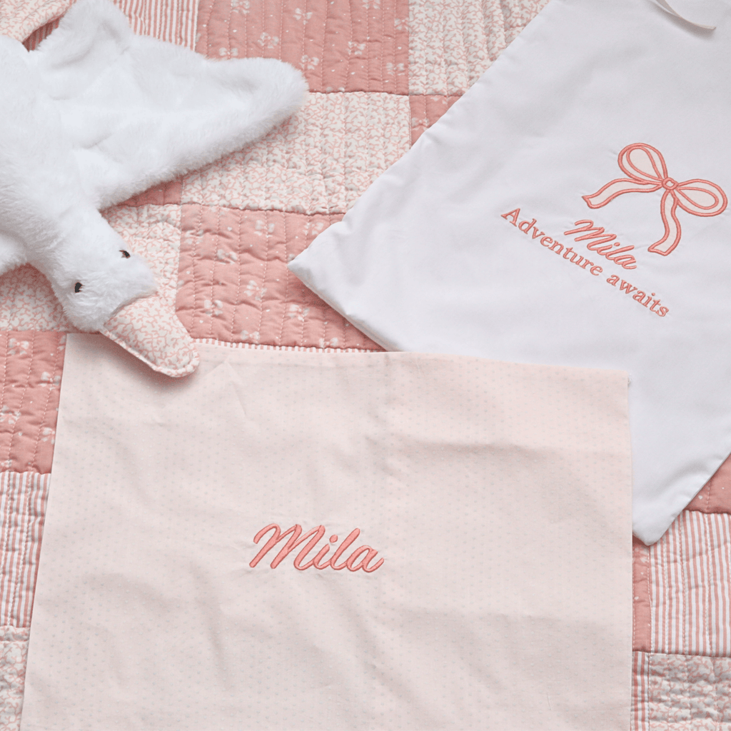 Little Darling Personalised Baby Quilt Gift Set featuring customized quilt and embroidered pillowcase with name Mila.