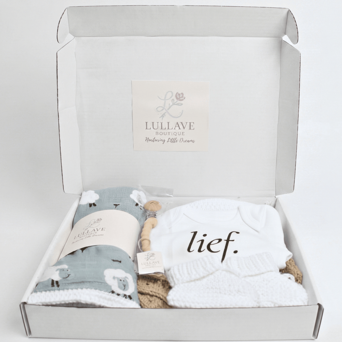 Little Sheep Baby Gift Box - Handmade featuring a cozy blanket and outfit, perfect for new parents and their baby.