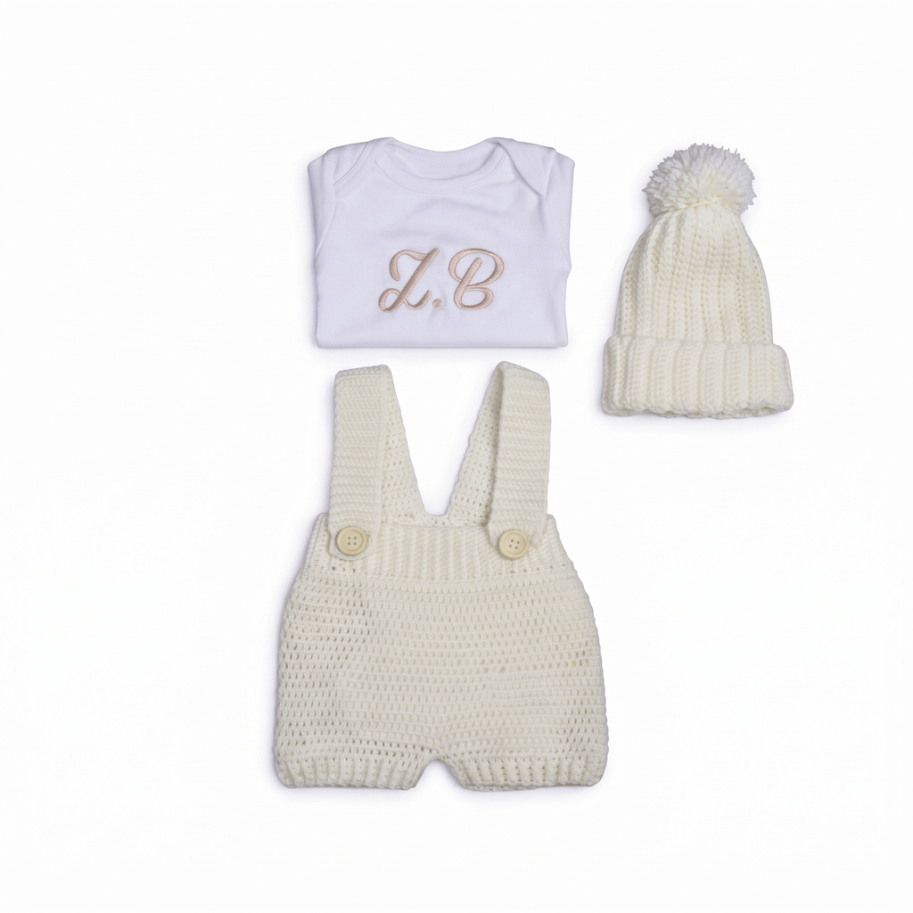 Personalised Little Farmer Set featuring a white onesie with initials, knitted shorts, and a matching hat.