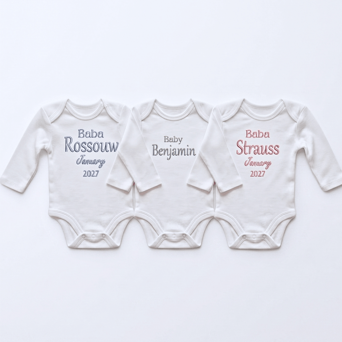 Personalised Baby Name Babygrow - Embroidered 100% Cotton in white, featuring custom names and colorful embroidery.