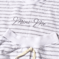 Close-up of the Cotton summer babywear set Mini Me Fun with striped design and 'Mini Me' embroidery for stylish baby outfits.