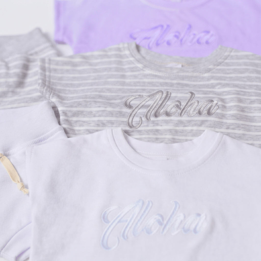 Aloha Keiki Baby Set - Stylish & Comfortable Babywear featuring soft cotton shirts in pastel colors.