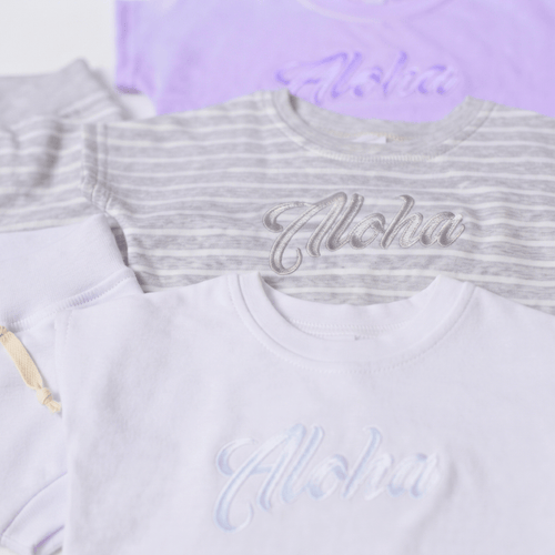 Aloha Keiki Baby Set - Stylish & Comfortable Babywear featuring soft cotton shirts in pastel colors.
